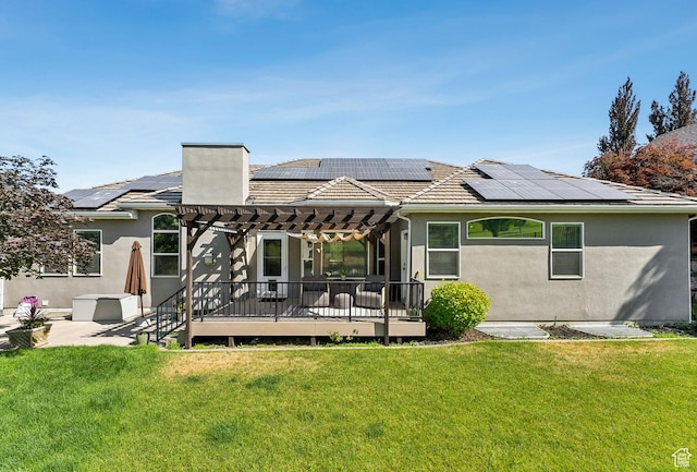 1036 E Fairway Dr, North Salt Lake, UT 84054 - rear view of house with a pergola, roof mounted solar panels, a yard, and stucco siding