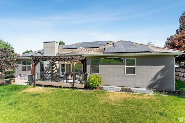1036 E Fairway Dr, North Salt Lake, UT 84054 - back of house featuring a pergola, roof mounted solar panels, and a yard