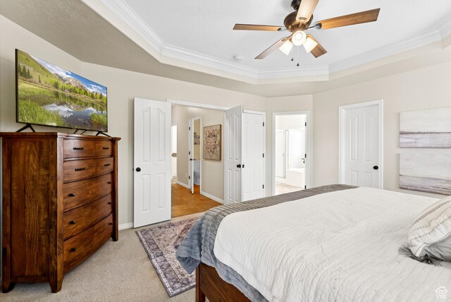 1036 E Fairway Dr, North Salt Lake, UT 84054 - bedroom featuring crown molding, a raised ceiling, light colored carpet, ensuite bath, and ceiling fan