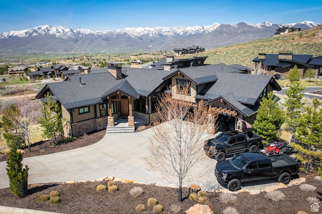 1467 N Chimney Rock Rd, Heber City, UT 84032 - view of front of property with stone siding, board and batten siding, a porch, and a mountain view
