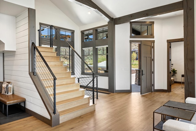 1467 N Chimney Rock Rd, Heber City, UT 84032 - entrance foyer with high vaulted ceiling, stairs, wood finished floors, and beam ceiling