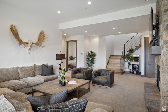 1467 N Chimney Rock Rd, Heber City, UT 84032 - living area with a stone fireplace, stairs, recessed lighting, and light colored carpet