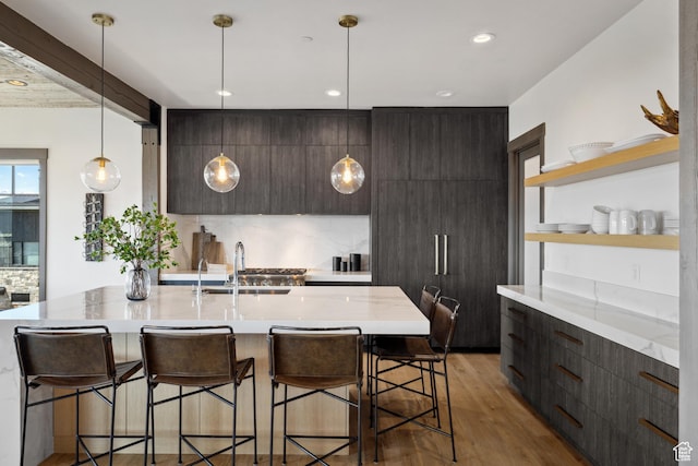 1467 N Chimney Rock Rd, Heber City, UT 84032 - kitchen with modern cabinets, open shelves, light wood-style floors, a breakfast bar, and recessed lighting
