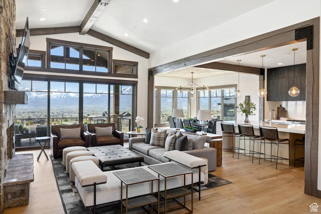 1467 N Chimney Rock Rd, Heber City, UT 84032 - living room featuring beam ceiling, light wood-style floors, recessed lighting, a chandelier, and high vaulted ceiling