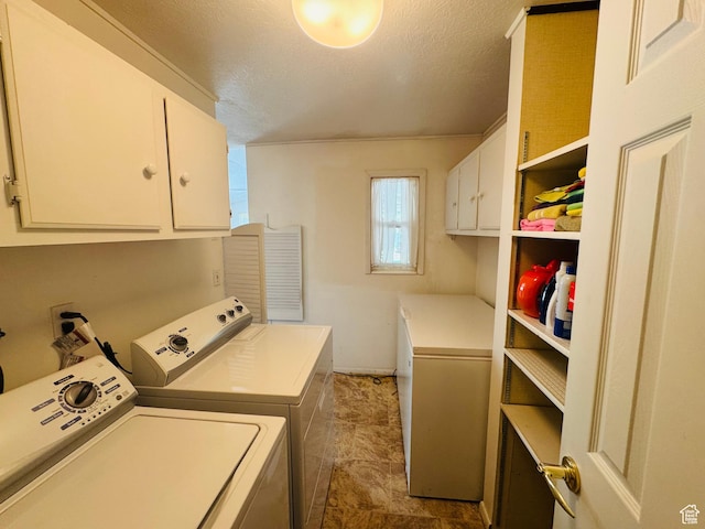 230 E 300 S, Ephraim, UT 84627 - washroom featuring cabinet space, washer and dryer, and a textured ceiling