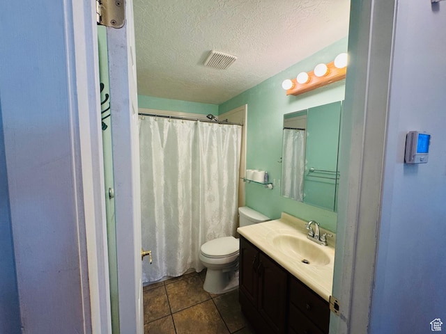 230 E 300 S, Ephraim, UT 84627 - bathroom featuring vanity, a textured ceiling, tile patterned flooring, and curtained shower