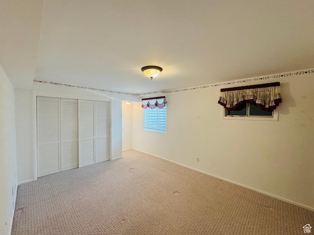 230 E 300 S, Ephraim, UT 84627 - unfurnished bedroom featuring light colored carpet and a closet
