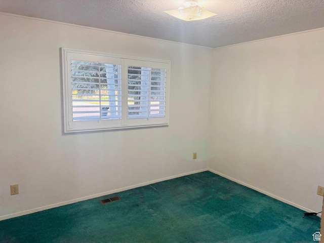 230 E 300 S, Ephraim, UT 84627 - unfurnished room with a textured ceiling and dark colored carpet