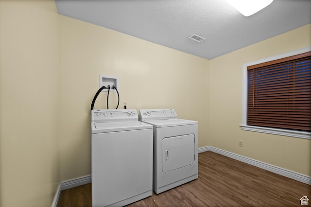 5864 Majestic Pine Dr, Murray, UT 84107 - laundry room featuring washer and dryer and wood finished floors