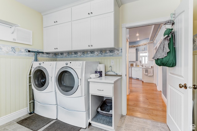 30455 N 11000 E, Fairview, UT 84629 - washroom featuring cabinet space, washing machine and dryer, and wainscoting