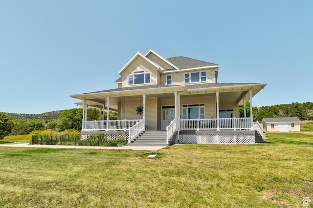 30455 N 11000 E, Fairview, UT 84629 - farmhouse-style home featuring covered porch, a front lawn, and roof with shingles