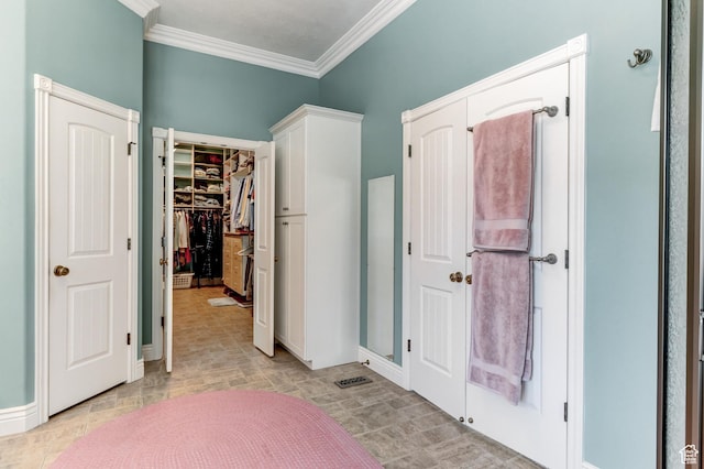 30455 N 11000 E, Fairview, UT 84629 - unfurnished bedroom featuring ornamental molding and a walk in closet