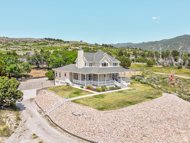 30455 N 11000 E, Fairview, UT 84629 - view of front of home with a porch, a chimney, roof with shingles, and a mountain view