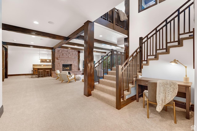 3327 E Wasatch Pines Ln, Sandy, UT 84092 - staircase with carpet floors, beam ceiling, recessed lighting, and an outdoor stone fireplace