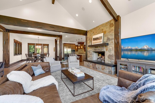 3327 E Wasatch Pines Ln, Sandy, UT 84092 - living area with beam ceiling, recessed lighting, high vaulted ceiling, and a fireplace