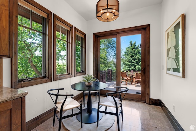 3327 E Wasatch Pines Ln, Sandy, UT 84092 - dining room with baseboards and a chandelier