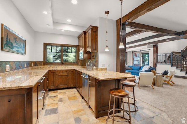 3327 E Wasatch Pines Ln, Sandy, UT 84092 - kitchen featuring a peninsula, light stone countertops, recessed lighting, open floor plan, and a kitchen breakfast bar