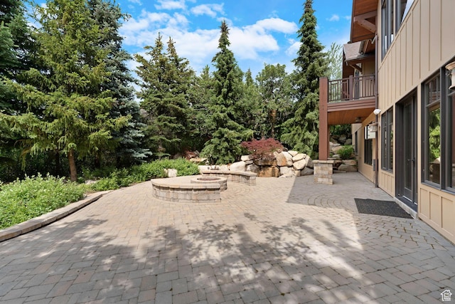 3327 E Wasatch Pines Ln, Sandy, UT 84092 - view of patio featuring a fire pit