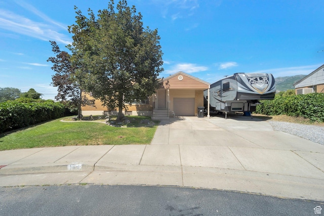144 W 4575 S, Washington Terrace, UT 84405 - view of property hidden behind natural elements with a front lawn, concrete driveway, and a garage
