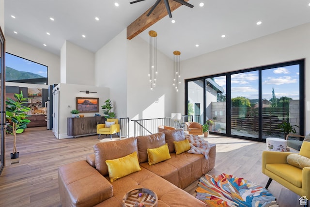 1882 N Main St, Mapleton, UT 84664 - living area with high vaulted ceiling, light wood finished floors, plenty of natural light, ceiling fan, and beam ceiling