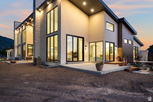 1882 N Main St, Mapleton, UT 84664 - back of house with a patio and stucco siding