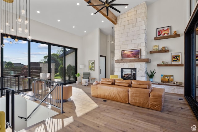 1882 N Main St, Mapleton, UT 84664 - living room with high vaulted ceiling, a fireplace, wood finished floors, ceiling fan, and recessed lighting