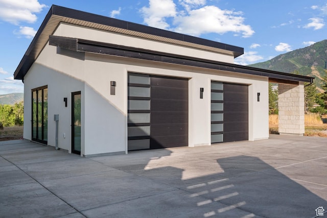 1882 N Main St, Mapleton, UT 84664 - garage with a mountain view and concrete driveway