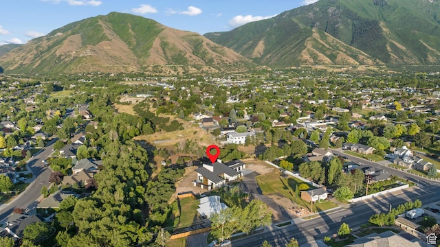 1882 N Main St, Mapleton, UT 84664 - aerial view of property and surrounding area featuring a mountain backdrop and nearby suburban area