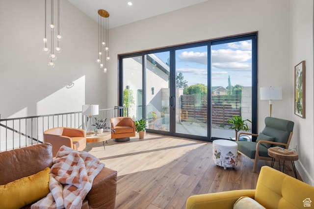1882 N Main St, Mapleton, UT 84664 - living area with wood-type flooring and a high ceiling