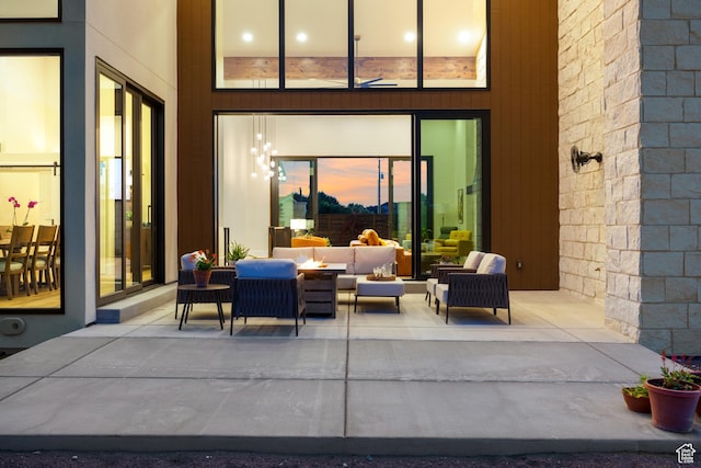 1882 N Main St, Mapleton, UT 84664 - patio terrace at dusk with an outdoor hangout area and a patio