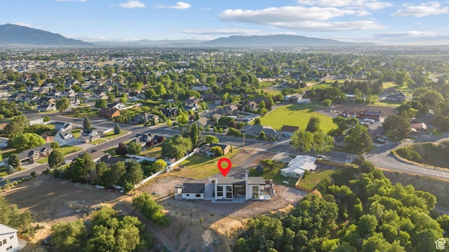 1882 N Main St, Mapleton, UT 84664 - aerial view of property's location featuring a mountain backdrop and nearby suburban area