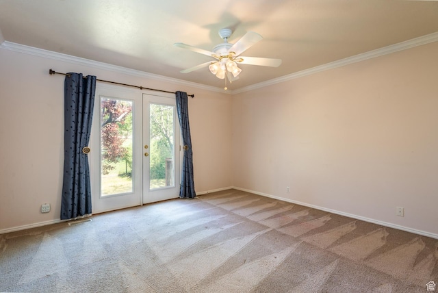 192 N 690 E, Tooele, UT 84074 - carpeted spare room with crown molding, a ceiling fan, and french doors
