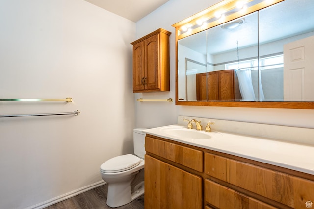 192 N 690 E, Tooele, UT 84074 - full bathroom with wood finished floors, vanity, and curtained shower