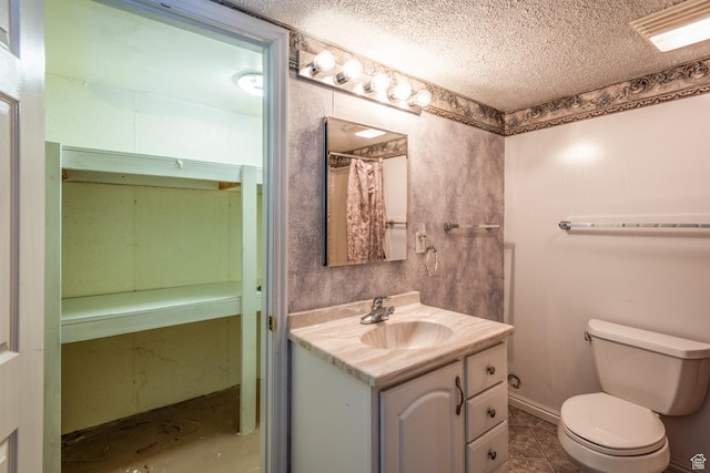 192 N 690 E, Tooele, UT 84074 - full bathroom featuring a textured ceiling and vanity