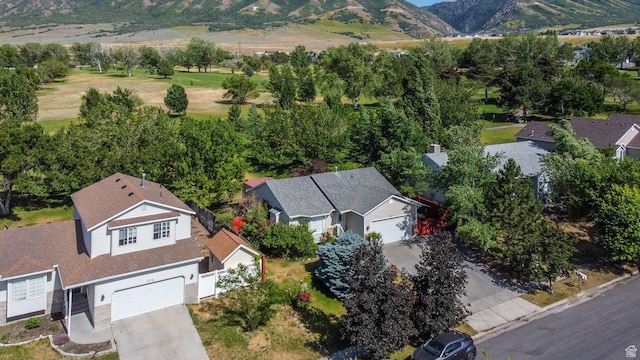 192 N 690 E, Tooele, UT 84074 - aerial view of property and surrounding area with a mountainous background