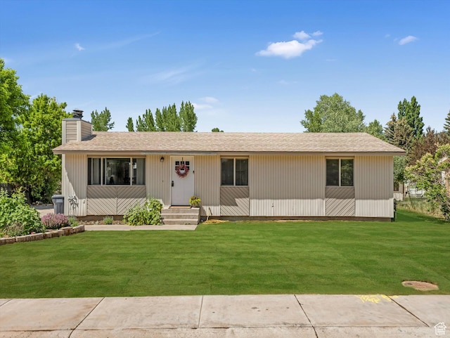 155 Hawthorne, Kamas, UT 84036 - view of front of home with a chimney and a front yard