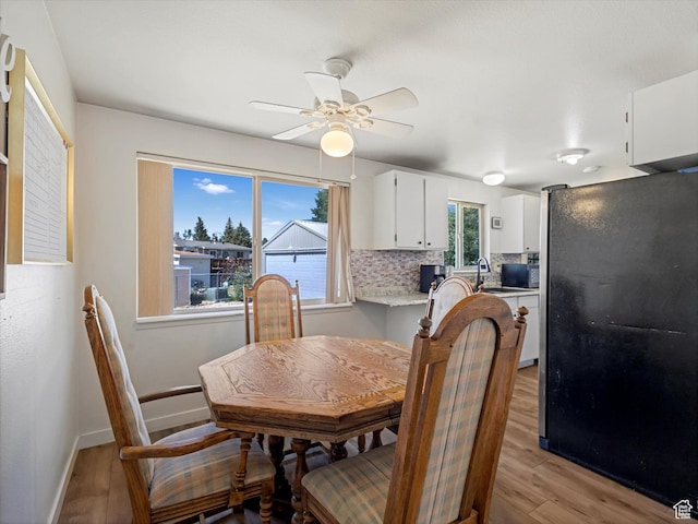 155 Hawthorne, Kamas, UT 84036 - dining room with light wood-style floors and ceiling fan