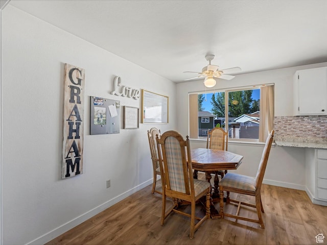 155 Hawthorne, Kamas, UT 84036 - dining room featuring light wood-type flooring and a ceiling fan