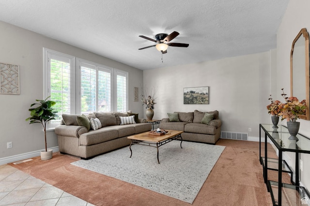 352 E Maple Dr, Alpine, UT 84004 - living room with ceiling fan, light colored carpet, a textured ceiling, and light tile patterned flooring