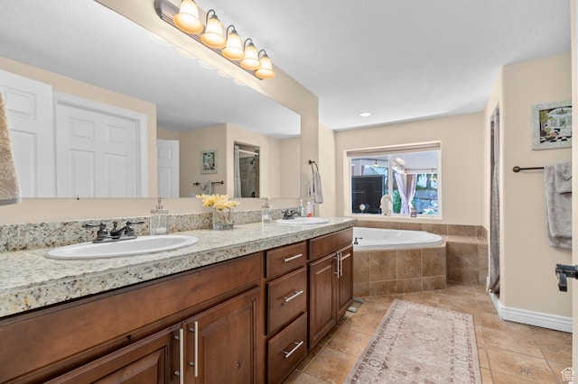 352 E Maple Dr, Alpine, UT 84004 - full bath with double vanity, a shower stall, a garden tub, and tile patterned floors