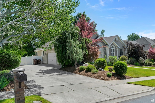 352 E Maple Dr, Alpine, UT 84004 - view of property hidden behind natural elements with an attached garage and driveway