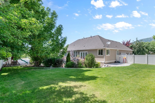 352 E Maple Dr, Alpine, UT 84004 - rear view of property featuring a gate, a patio, stucco siding, and french doors