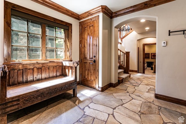 8789 Marsac Ave Unit 4, Park City, UT 84060 - foyer with stone floors, stairway, arched walkways, and ornamental molding