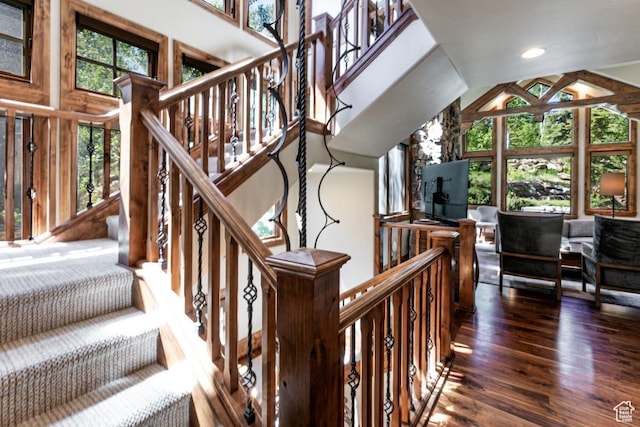 8789 Marsac Ave Unit 4, Park City, UT 84060 - stairway with wood finished floors, a towering ceiling, and recessed lighting