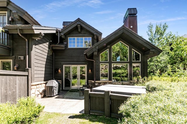 8789 Marsac Ave Unit 4, Park City, UT 84060 - rear view of property with a patio, french doors, and a chimney