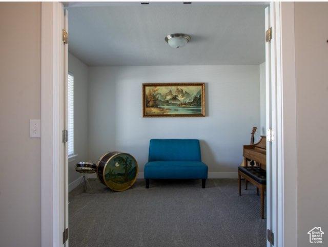 4910 N Deseret Peak Dr, Eagle Mountain, UT 84005 - sitting room with carpet and baseboards