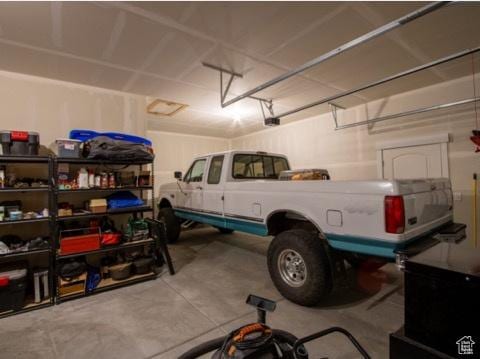 4910 N Deseret Peak Dr, Eagle Mountain, UT 84005 - garage featuring a garage door opener