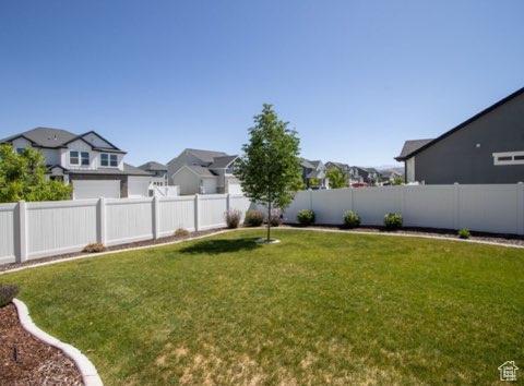 4910 N Deseret Peak Dr, Eagle Mountain, UT 84005 - fenced backyard featuring a residential view