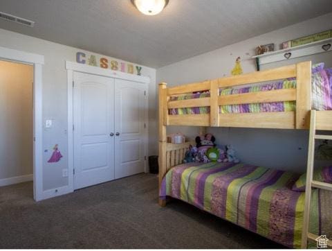 4910 N Deseret Peak Dr, Eagle Mountain, UT 84005 - carpeted bedroom featuring a closet and baseboards