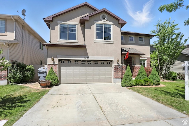 1061 N Bellingham Ct W, North Salt Lake, UT 84054 - traditional-style house with stucco siding, brick siding, an attached garage, and driveway